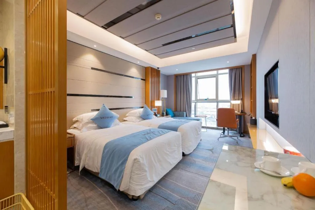 Bed in Excemon Yuyao Hemudu Hotel