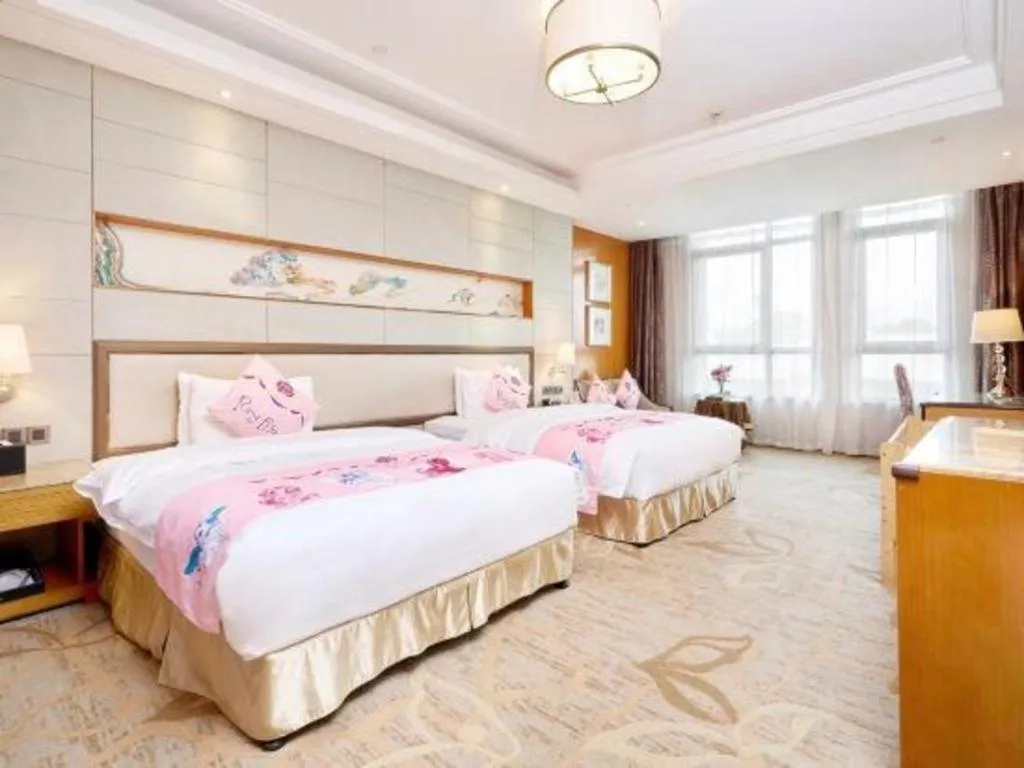 Bed in Mingdu Ziwei Garden Hotel