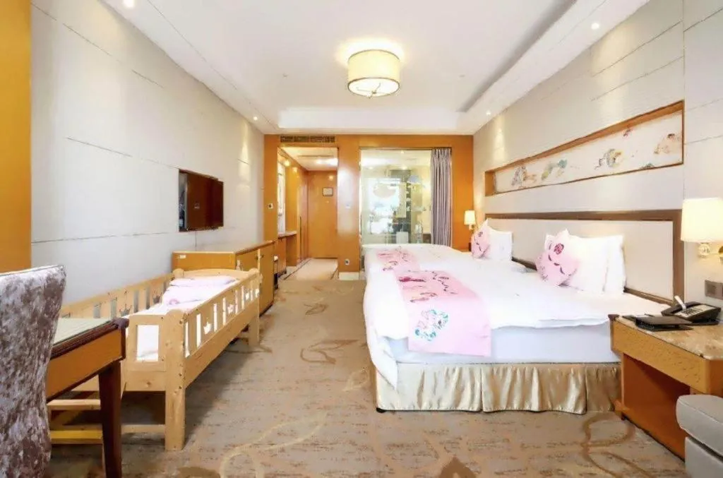 Bed in Mingdu Ziwei Garden Hotel