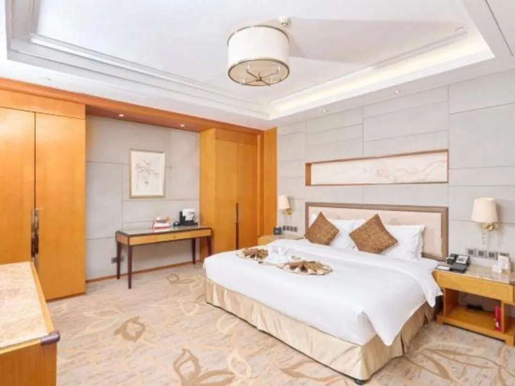 Bed in Mingdu Ziwei Garden Hotel