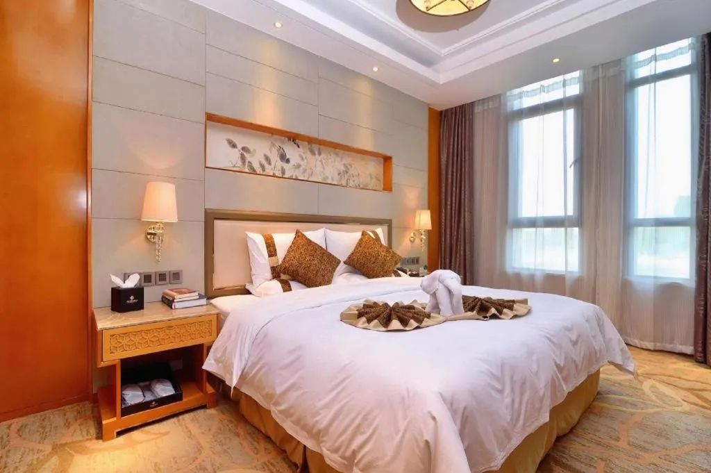 Bed in Mingdu Ziwei Garden Hotel