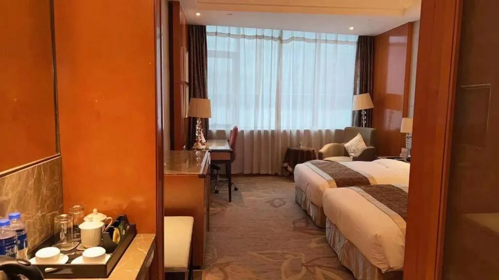 Bed in Mingdu Ziwei Garden Hotel