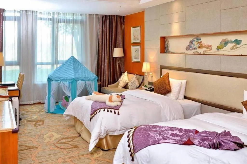 Bed in Mingdu Ziwei Garden Hotel