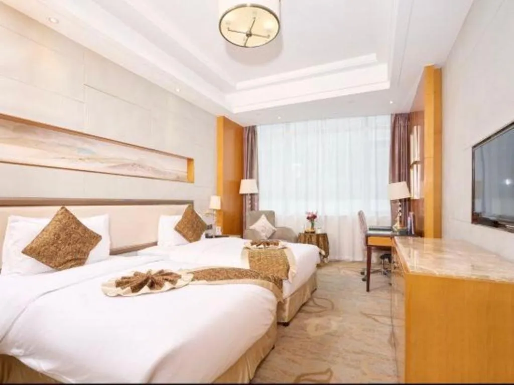 Bed in Mingdu Ziwei Garden Hotel