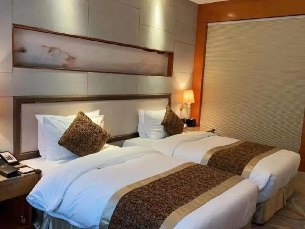 Bed in Mingdu Ziwei Garden Hotel