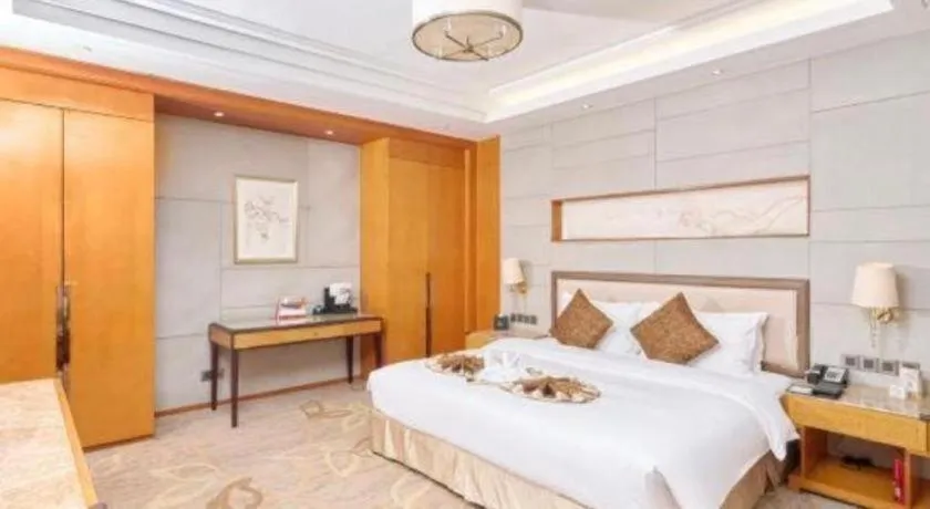 Bed in Mingdu Ziwei Garden Hotel