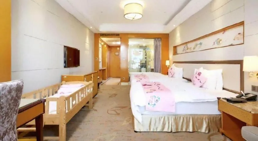 Bed in Mingdu Ziwei Garden Hotel