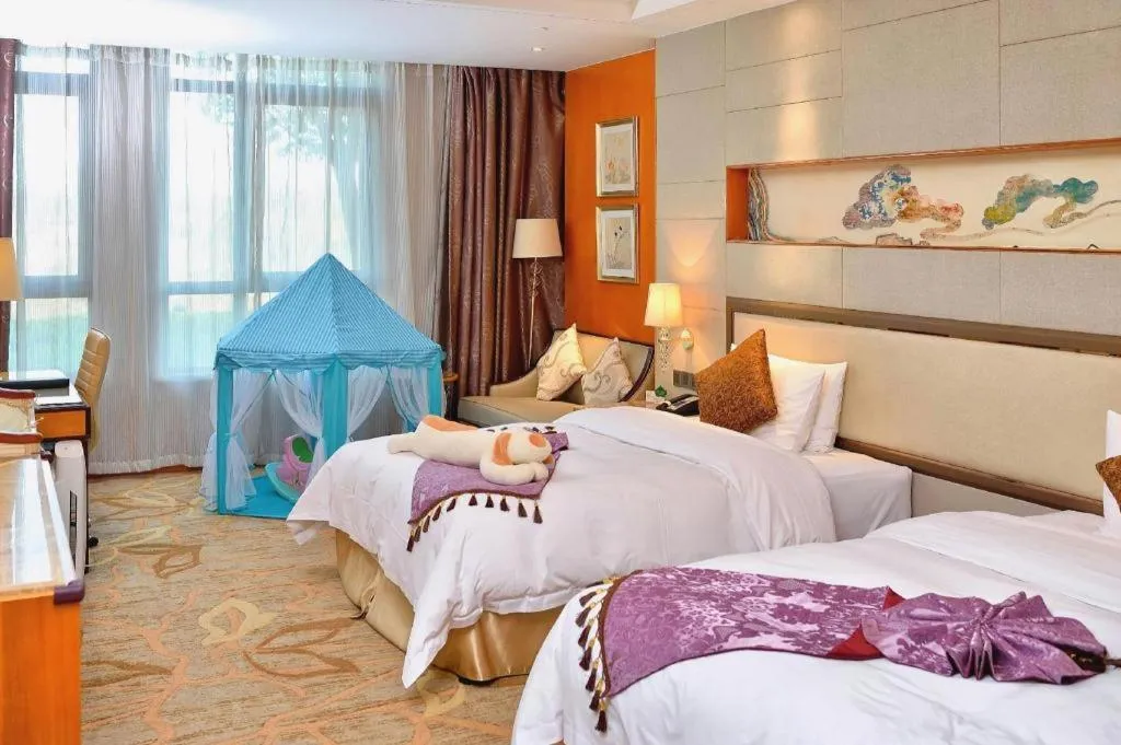 Bed in Mingdu Ziwei Garden Hotel