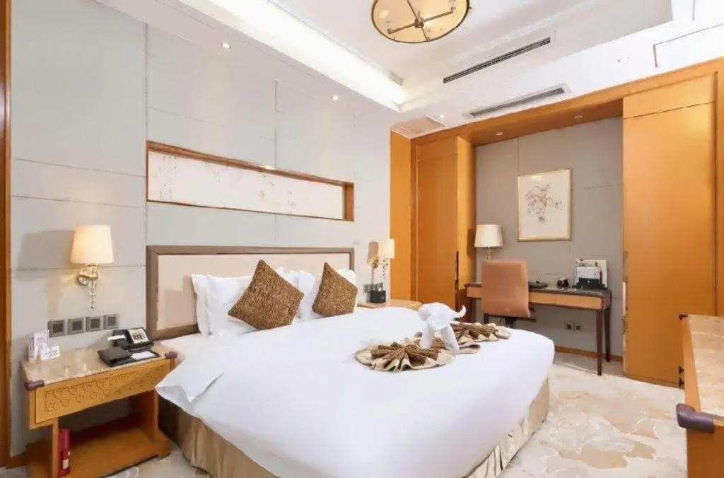 Bed in Mingdu Ziwei Garden Hotel