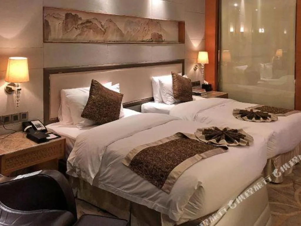 Bed in Mingdu Ziwei Garden Hotel