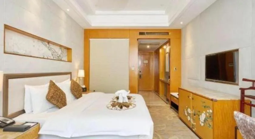 Bed in Mingdu Ziwei Garden Hotel