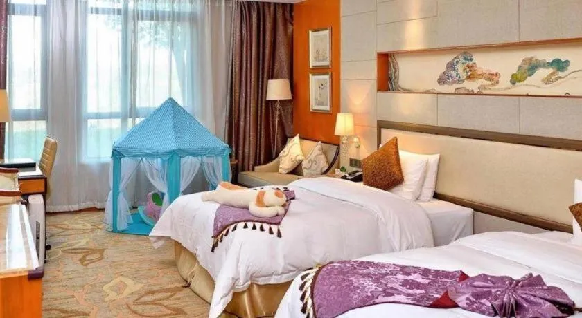 Bed in Mingdu Ziwei Garden Hotel