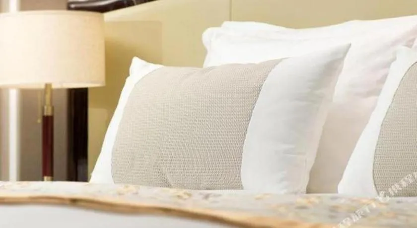 Bed in Grand Bay Hotel Beijing