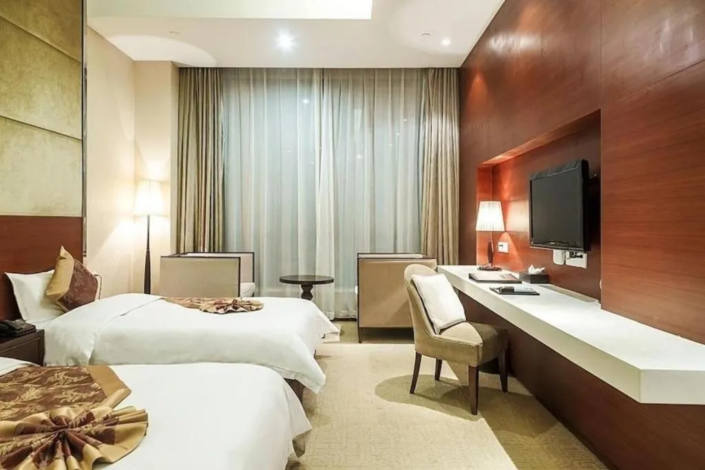 Bed in Suzhou Phoenix Hotspring Resort