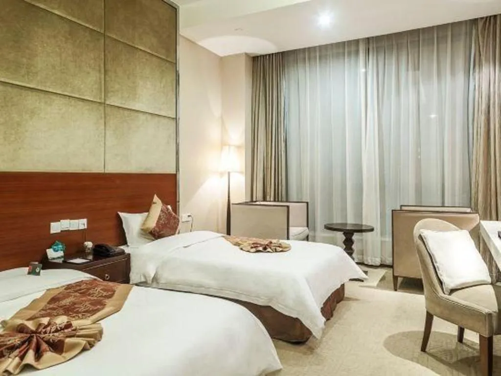 Bed in Suzhou Phoenix Hotspring Resort