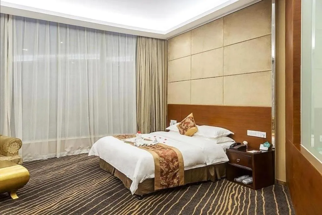 Bed in Suzhou Phoenix Hotspring Resort