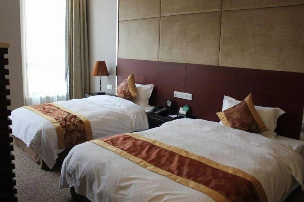 Bed in Suzhou Phoenix Hotspring Resort