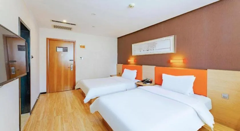 Bed in IU Hotel Tianjin Youyi Road Meijiang Exhibition Meiniu Metro Station