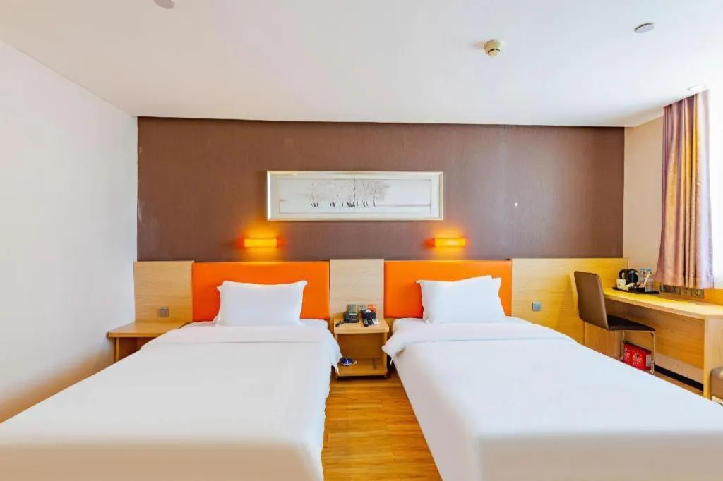 Bed in IU Hotel Tianjin Youyi Road Meijiang Exhibition Meiniu Metro Station