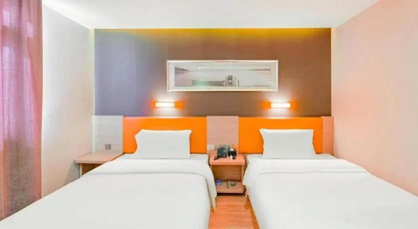 Bed in IU Hotel Tianjin Youyi Road Meijiang Exhibition Meiniu Metro Station