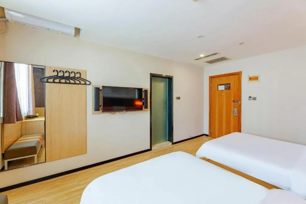 Bed in IU Hotel Tianjin Youyi Road Meijiang Exhibition Meiniu Metro Station