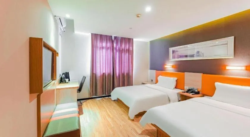 Bed in IU Hotel Tianjin Youyi Road Meijiang Exhibition Meiniu Metro Station