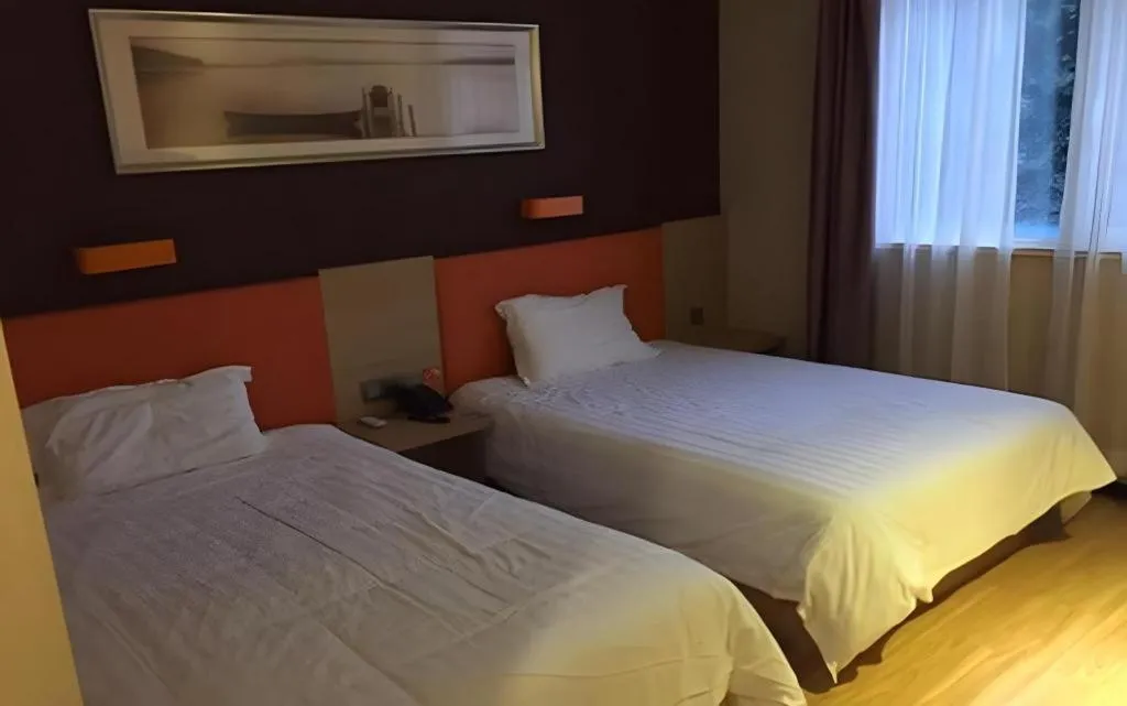 Bed in IU Hotel Tianjin Youyi Road Meijiang Exhibition Meiniu Metro Station