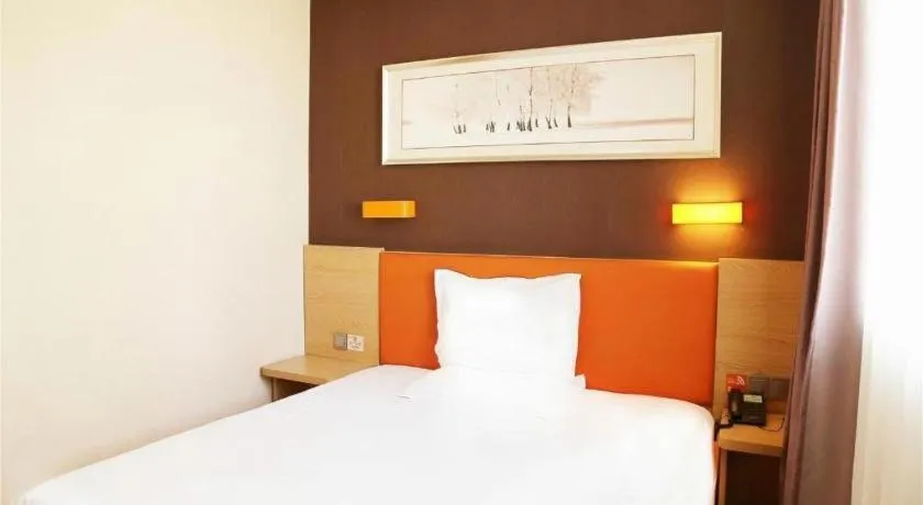 Bed in IU Hotel Tianjin Youyi Road Meijiang Exhibition Meiniu Metro Station