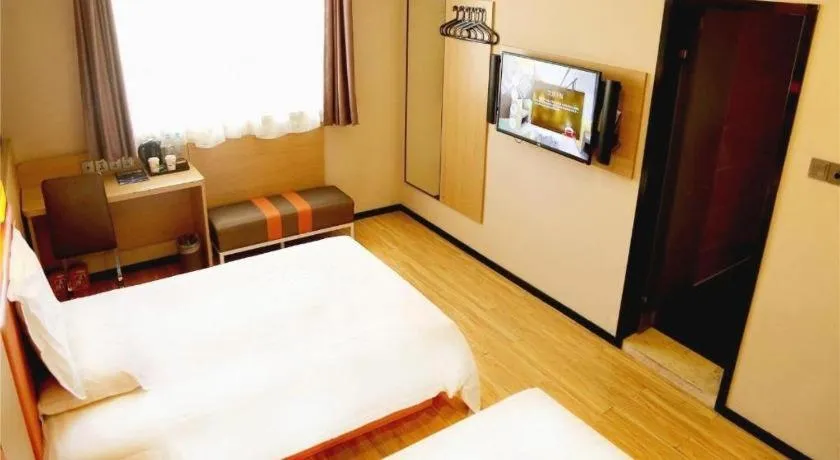 Bed in IU Hotel Tianjin Youyi Road Meijiang Exhibition Meiniu Metro Station