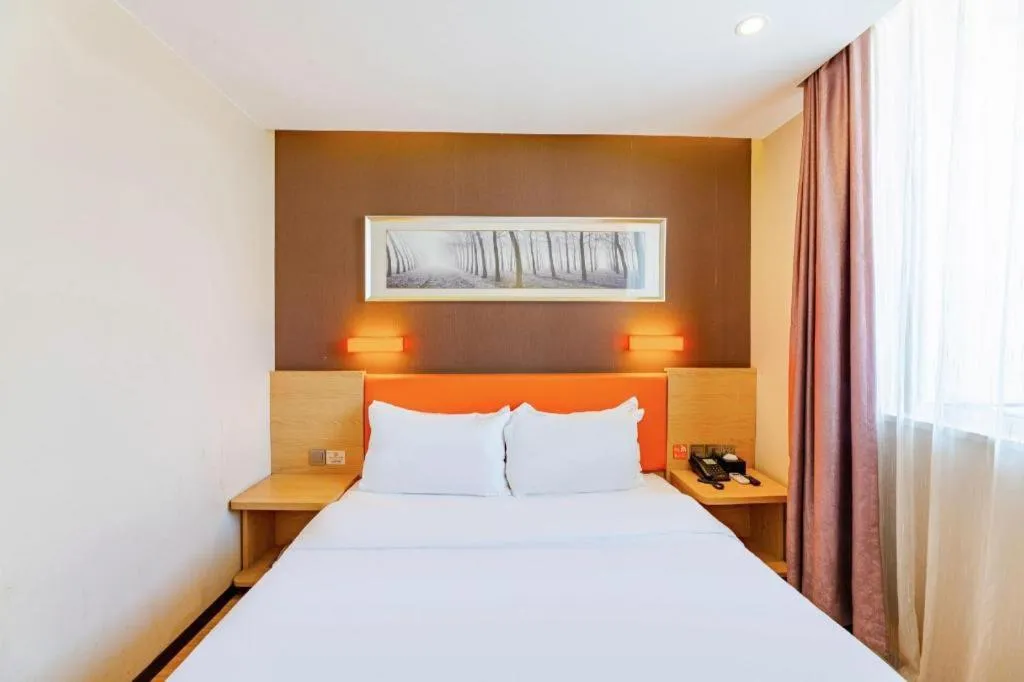 Bed in IU Hotel Tianjin Youyi Road Meijiang Exhibition Meiniu Metro Station