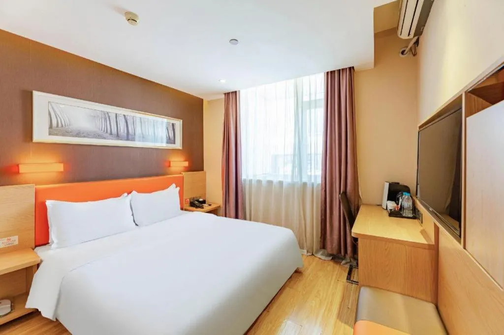 Bed in IU Hotel Tianjin Youyi Road Meijiang Exhibition Meiniu Metro Station