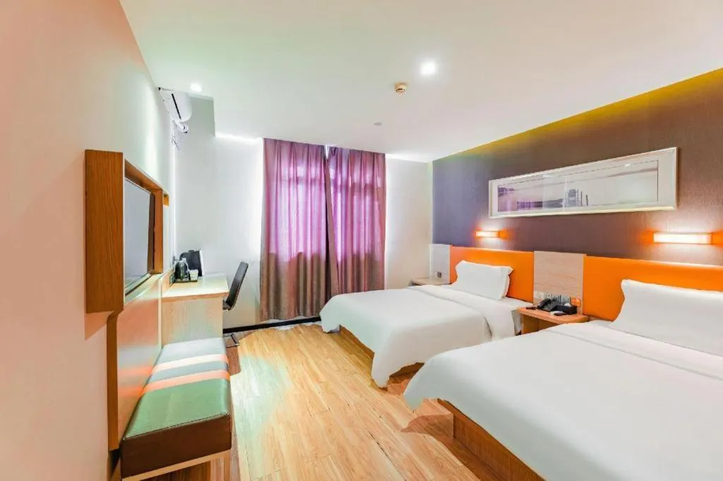 Bed in IU Hotel Tianjin Youyi Road Meijiang Exhibition Meiniu Metro Station