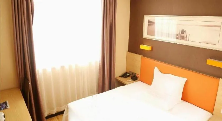 Bed in IU Hotel Tianjin Youyi Road Meijiang Exhibition Meiniu Metro Station