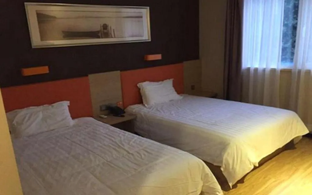 Bed in IU Hotel Tianjin Youyi Road Meijiang Exhibition Meiniu Metro Station