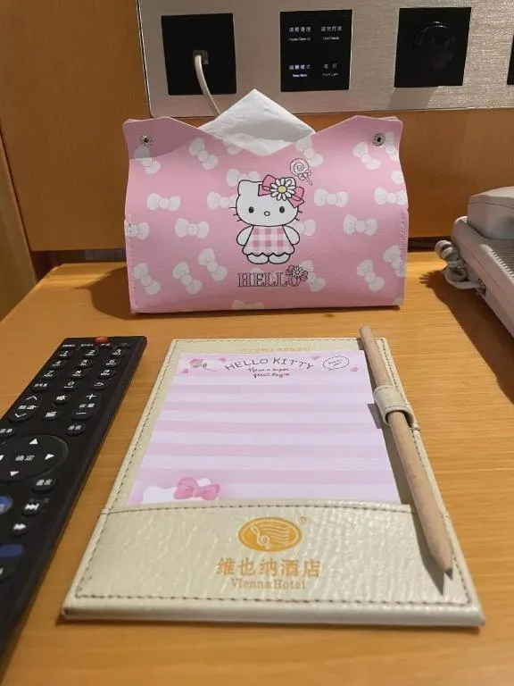 Bed in Vienna Hotel Guangxi Liuzhou Xijiang Vientiane City