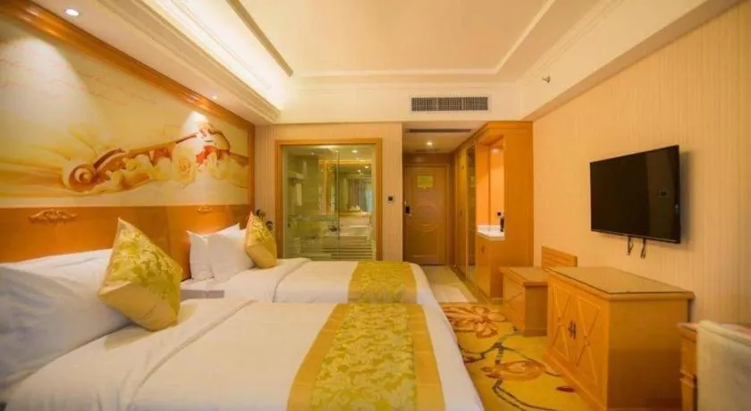 Bed in Vienna Hotel Guangxi Liuzhou Xijiang Vientiane City