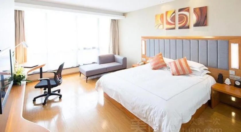 Bed in Warmly Hotel Suzhou Shuanghuwan