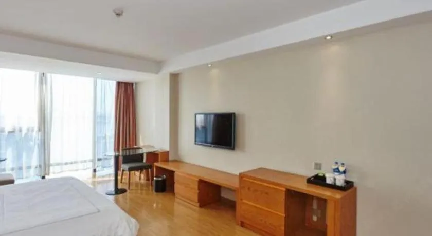 Bed in Warmly Hotel Suzhou Shuanghuwan