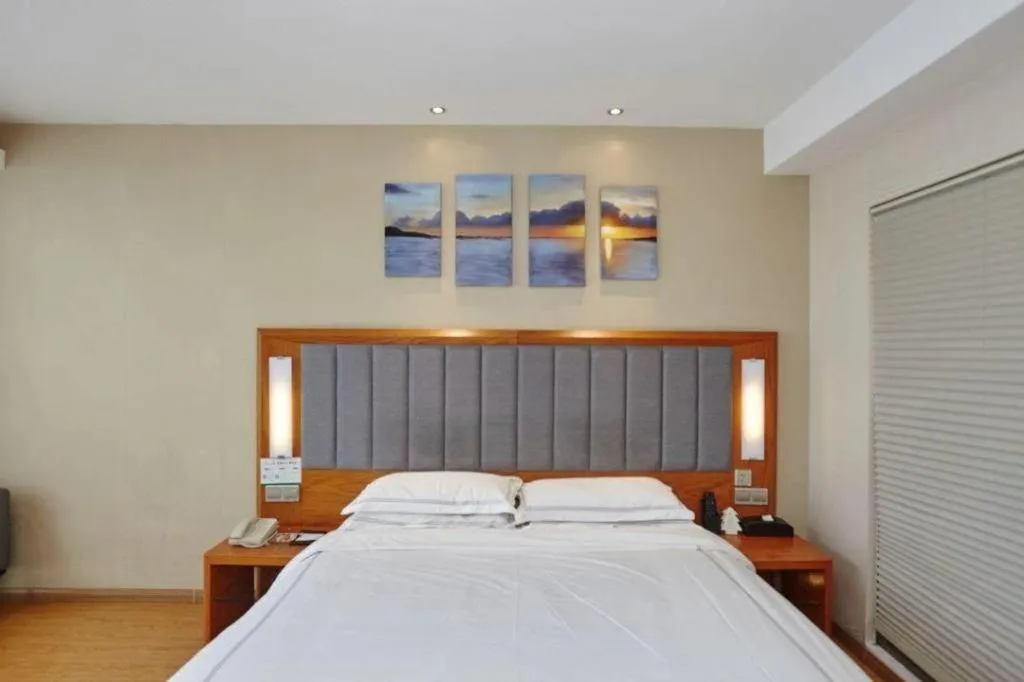 Bed in Warmly Hotel Suzhou Shuanghuwan