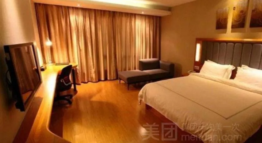 Bed in Warmly Hotel Suzhou Shuanghuwan