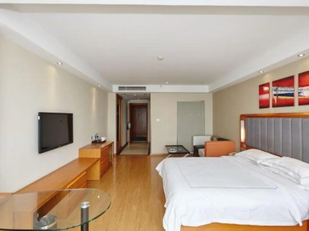 Bed in Warmly Hotel Suzhou Shuanghuwan