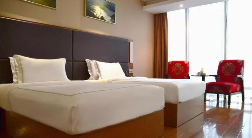 Bed in Warmly Hotel Suzhou Shuanghuwan