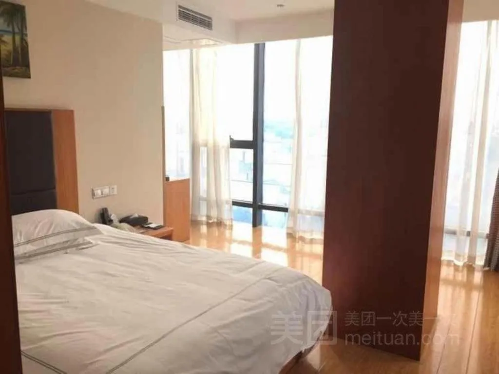 Bed in Warmly Hotel Suzhou Shuanghuwan