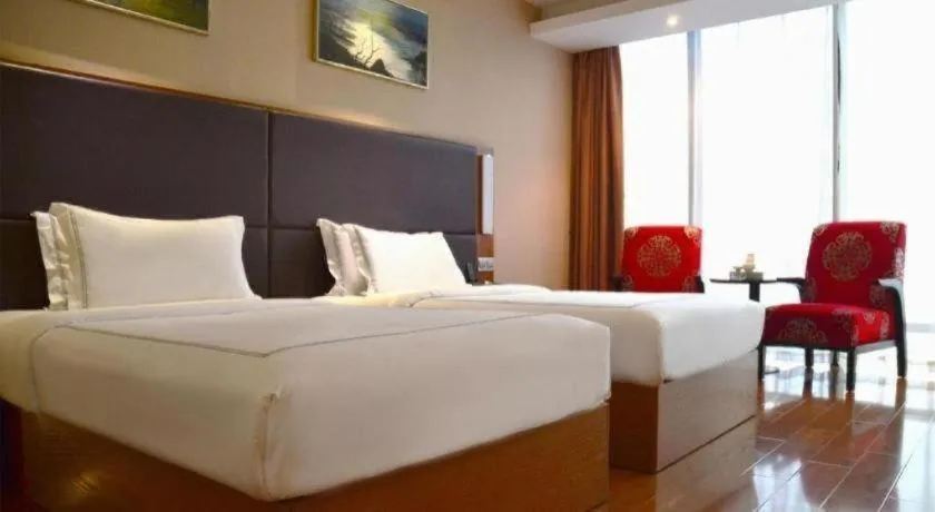 Bed in Warmly Hotel Suzhou Shuanghuwan