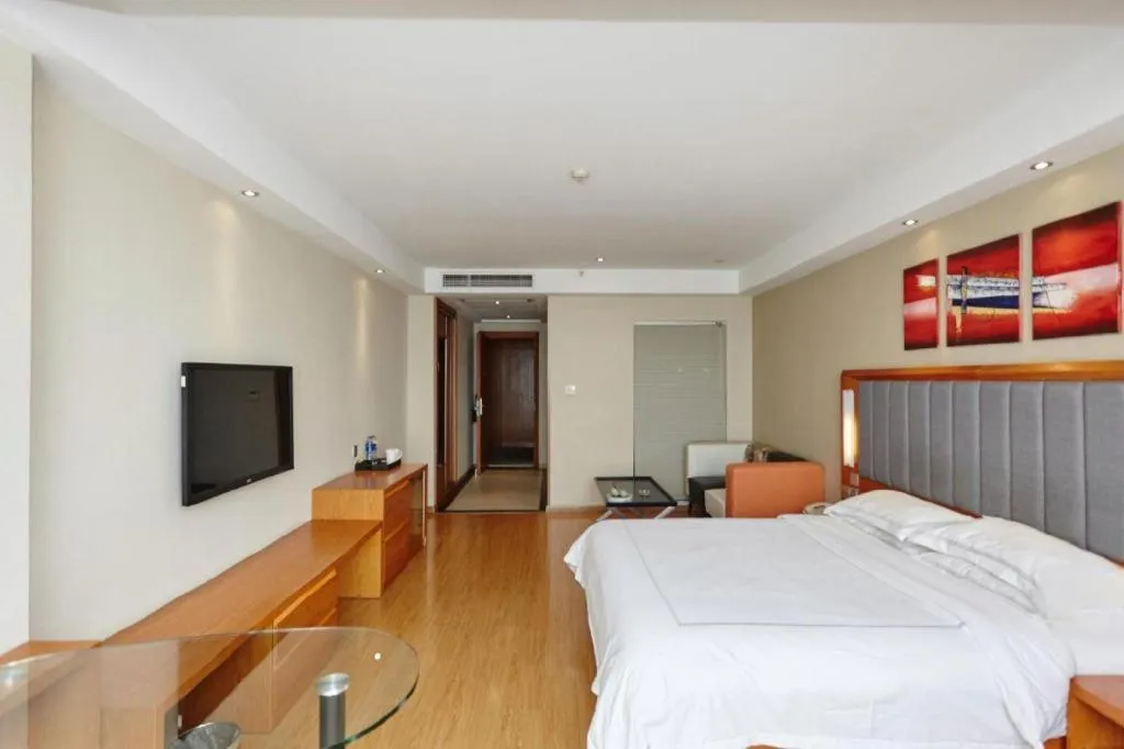 Bed in Warmly Hotel Suzhou Shuanghuwan