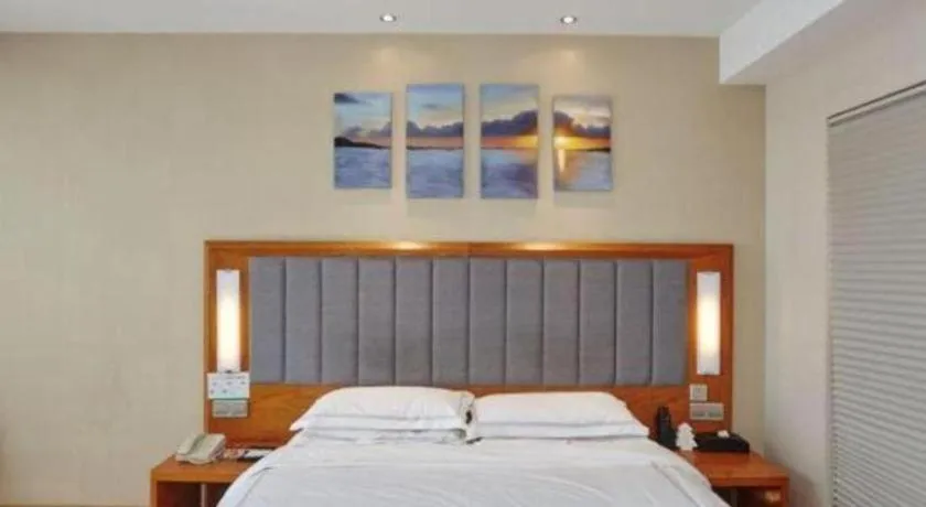 Bed in Warmly Hotel Suzhou Shuanghuwan