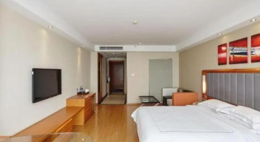 Bed in Warmly Hotel Suzhou Shuanghuwan