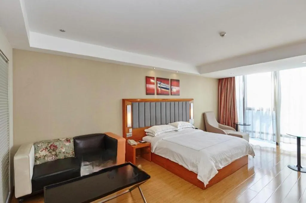 Bed in Warmly Hotel Suzhou Shuanghuwan