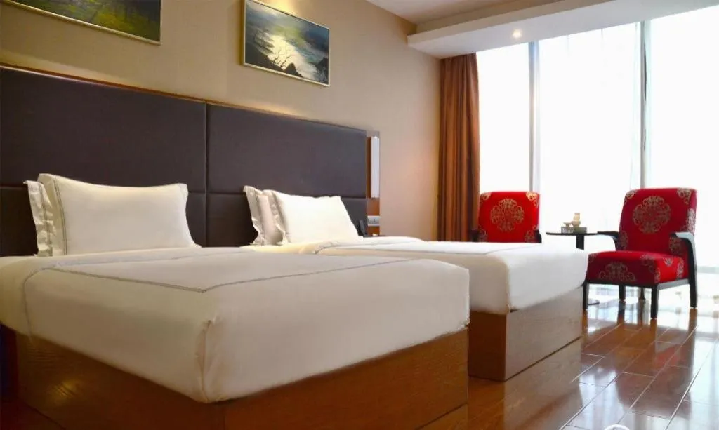 Bed in Warmly Hotel Suzhou Shuanghuwan