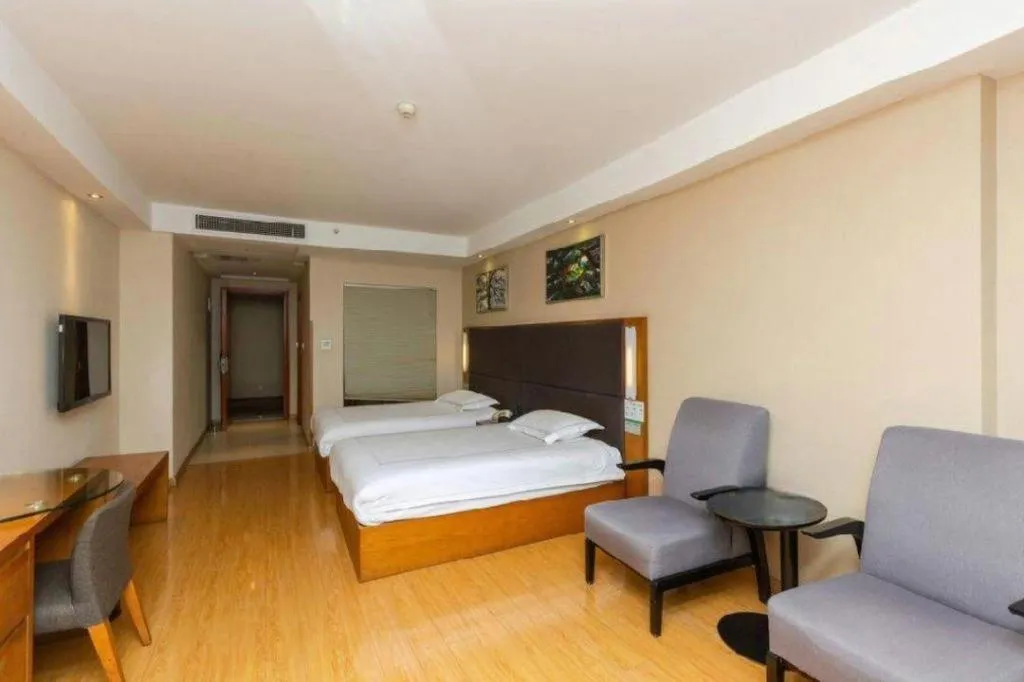 Bed in Warmly Hotel Suzhou Shuanghuwan